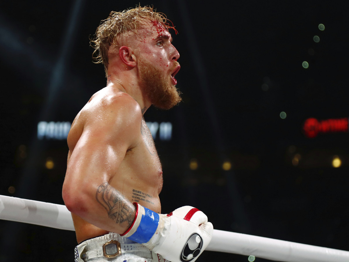 Jake Paul reacts during a fight against Tyron Woodley at Amalie Arena.